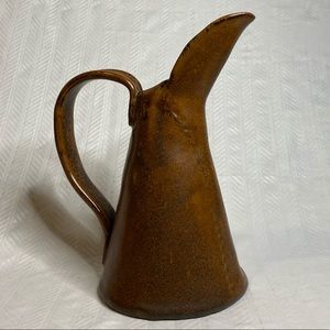 Vintage primitive ceramic water pitcher.
